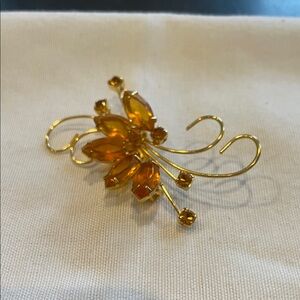 Elegant Gold and Orange Floral Brooch